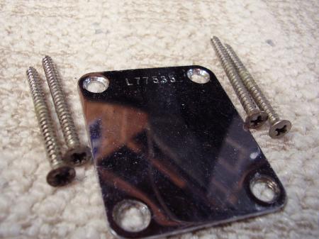 1964 ORIG NECK PLATE AND 4 SCREWS